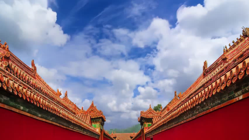 Clouds moving over Tourists visiting Imperial hall standing traditional architecture, Forbidden Historic ancient buildings City, China. Chinese on plague Ancient royal palace Hall of Supreme Harmony