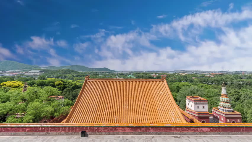 Clouds moving over Tourists visiting Imperial hall standing traditional architecture, Forbidden Historic ancient buildings City, China. Chinese on plague Ancient royal palace Hall of Supreme Harmony