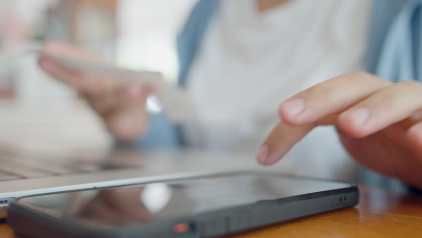 A person is using a cell phone to make a payment. Concept of convenience and ease, as the person is able to complete a transaction quickly and easily using their phone