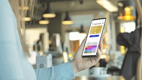 female holding smart phone paying online using digital wallet credit card,woman sits at the cafe' using smartphone mobile to make a payment on internet - Powered by Shutterstock - Get 15% off with code: PIKWIZARD15