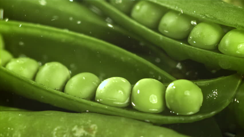 Fresh green peas. Filmed on a high-speed camera at 1000 fps. High quality FullHD footage