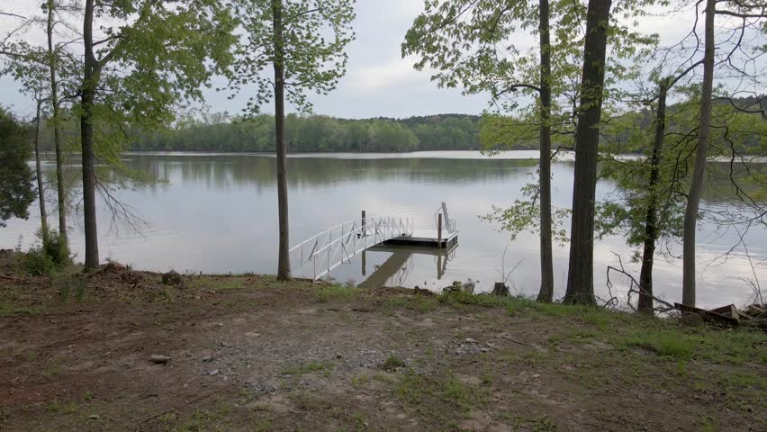 Empty boat dock on the lake. Fly in shot. Lake Murray in South Carolina.