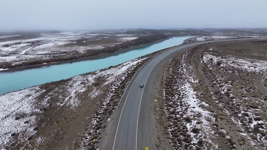 Ruta 40 Road At El Calafate Santa Cruz Argentina. Breathtaking Aerial View Of Busy Traffic In A Freeway Road. South Pole Tourism Glacial Landscape Snow Capped. Glacial Landscape Lakeshore Outdoor.