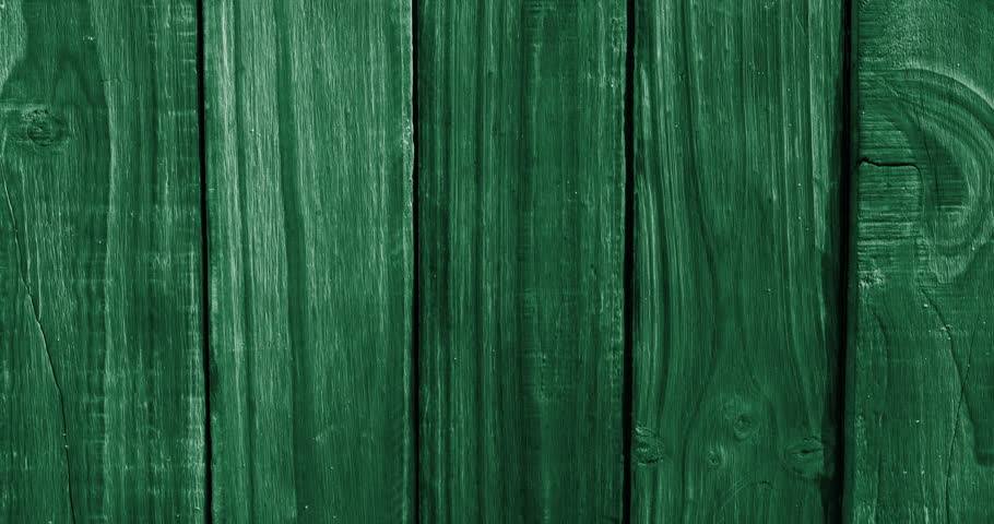 Animation of happy thanksgiving text over autumn leaves on green wooden boards. Thanksgiving, american patriotism, festivity, celebration and tradition concept digitally generated video.