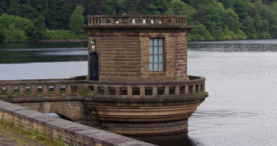 wide shot of the dam control building at Ladybower Reservoir