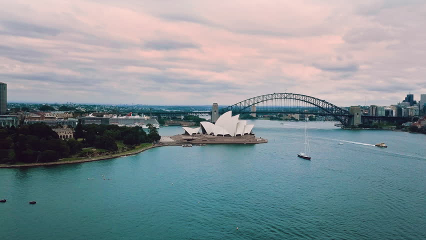 Panorama Of Opera House And Sydney Harbour Bridge In Sydney, New South Wales, Australia. Aerial Drone Shot