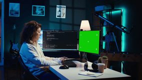 Freelancing admin using green screen computer monitors to filter malicious traffic from cybercriminals attempting to corrupt company data. IT expert in apartment working on mockup desktop PC, camera B - Powered by Shutterstock - Get 15% off with code: PIKWIZARD15