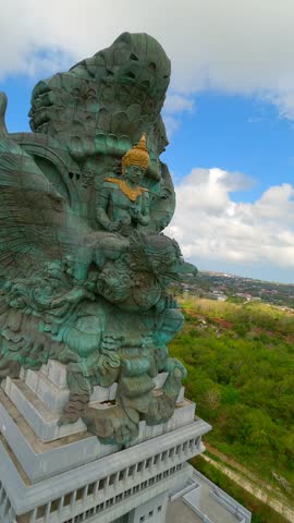 Cinematic FPV shot of Garuda Wisnu Kencana Statue in Bali, Indonesia