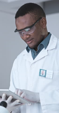 Tablet, science and research with face of black man in laboratory for medical, healthcare and pharmacy innovation. Synthetic stem cell treatment, results and study with person and breakthrough