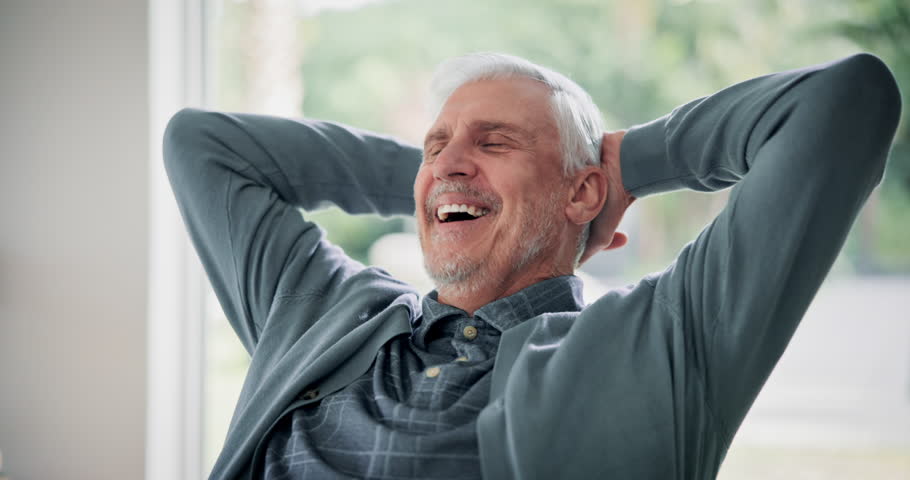 Success, happy and mature man on laptop in home for retirement bonus, payment and investment. Fist pump, finance and senior person on computer for loan application, winning and savings in living room
