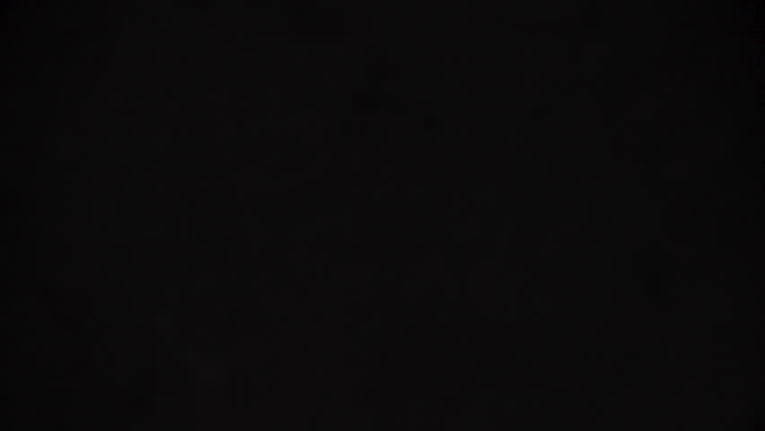 US Quarter Coin Rising into Frame and Falling Back Down