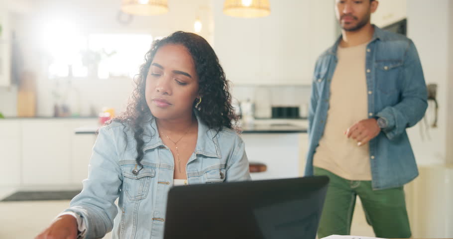 Hug, laptop and remote work with couple in home dining room together for freelance employment. Computer, conversation or love with man and woman embracing in apartment for small business startup