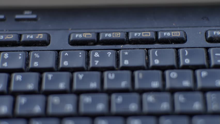 Old dirty Laptop Computer Keyboard.  Dusty Computer Keyboard