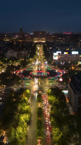 Time lapse of cars moving through Bucharest, Romania, at night. Vertical