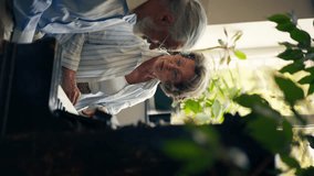 vertical video elderly people sitting at the piano together playing a melody learning new chords old age memories of an elderly couple pleasant leisure time in old age warm feelings support in old age - Powered by Shutterstock - Get 15% off with code: PIKWIZARD15