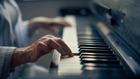 hands close up an elderly woman sits at the piano playing a melody learning new chords old age memories of an elderly couple pleasant leisure time in old age warm feelings support in old age - Powered by Shutterstock - Get 15% off with code: PIKWIZARD15