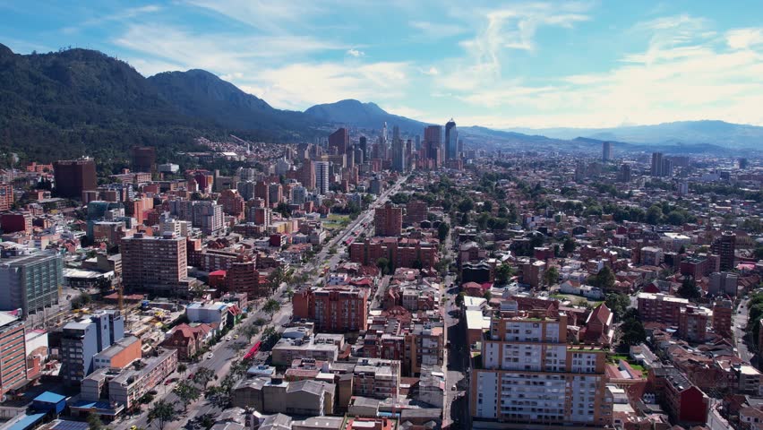 Aerial, Bogota Colombia, Residential Buildings, Streets and Downtown in Misty Skyline