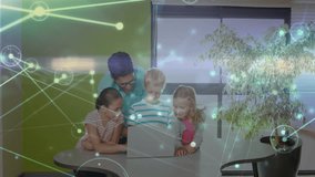 Animation of network of connections over diverse schoolchildren and male teacher using tablet. Global education, learning, connections and digital interface concept digitally generated video. - Powered by Shutterstock - Get 15% off with code: PIKWIZARD15