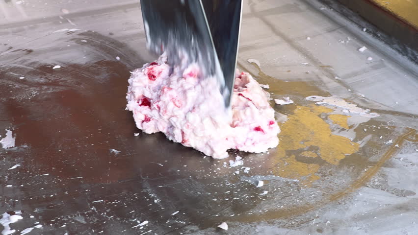 Rolled ice cream with fresh strawberries