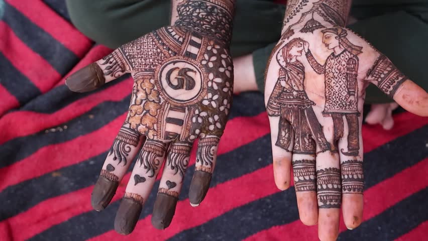 Bangalore, India 7th September 2024: Indian Groom wedding henna mehendi mehndi feet close up. Henna pattern. Traditional Rasam or rivaz of done with henna mehandi. Practiced in India and Pakistan