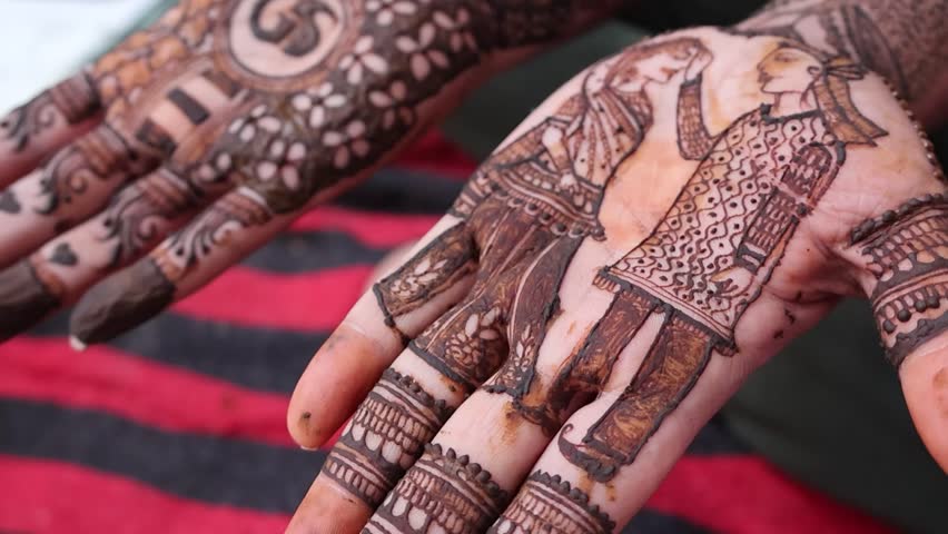 Bangalore, India 7th September 2024: Indian Groom wedding henna mehendi mehndi feet close up. Henna pattern. Traditional Rasam or rivaz of done with henna mehandi. Practiced in India and Pakistan