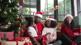 Family decorate Christmas tree at home. Christmas and celebration. - Powered by Shutterstock - Get 15% off with code: PIKWIZARD15