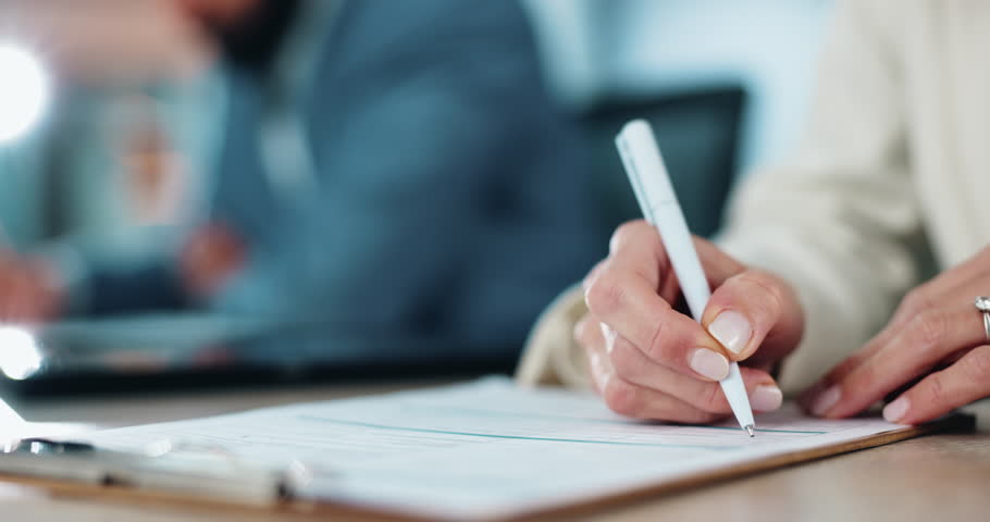 Hands, writing and clipboard at meeting, documents and business people with deal for b2b collaboration in office. Person, checklist and paperwork in review, agreement and signature at creative agency