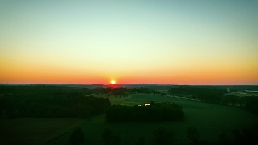 Green meadows, fields and a pond in midwest state of Kentucky near Wester Kentucky Parkway and the city of Beaver Dam