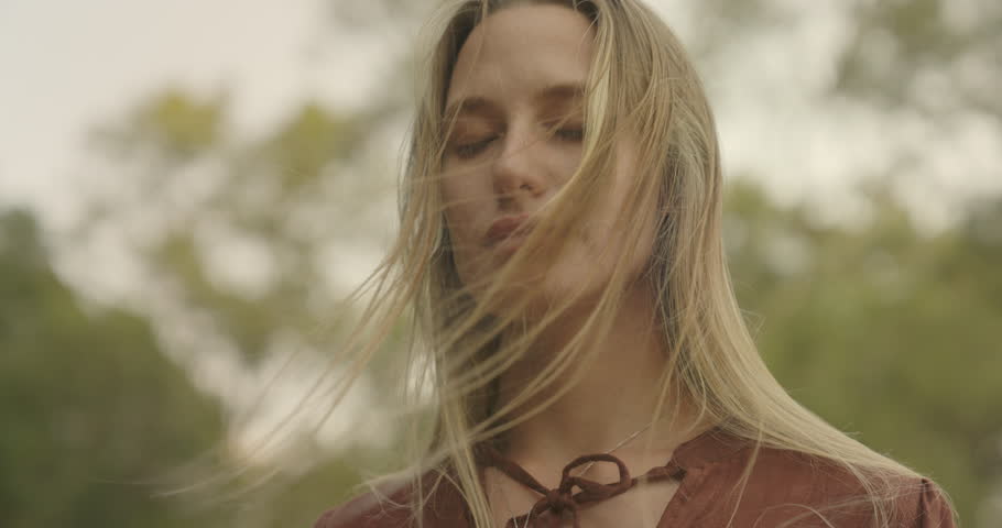 Woman breathing fresh air outdoors