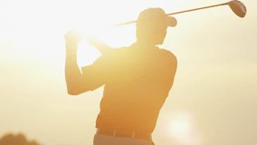 Weekend male golfer enjoying time golf course in summer driving off down fairway sunset resort club - Powered by Shutterstock - Get 15% off with code: PIKWIZARD15