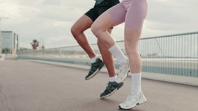 Male and female sportspeople in summer do a full body warm-up, enjoy teamwork, couple goals and motivation. Happy fit people are cheerfully doing sports - Powered by Shutterstock - Get 15% off with code: PIKWIZARD15