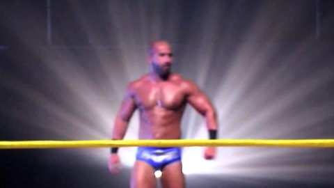 PORTSMOUTH - AUGUST 18: Former WWE Superstar Shawn Daivari Makes his Entrance to the Arena during VPW Wrestling Show on August 18, 2011 in Portsmouth, England.