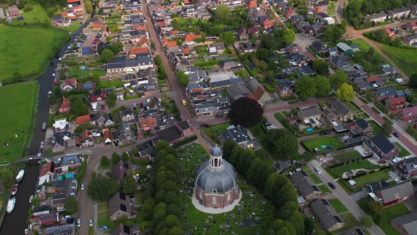 An aerial panorama view around the old town of the city Berlikum on a sunny summer day in the Netherlands