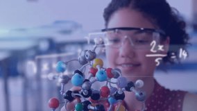 Animation of mathematical equations over biracial schoolgirl during chemistry lesson. Global science, education, learning and digital interface concept digitally generated video. - Powered by Shutterstock - Get 15% off with code: PIKWIZARD15