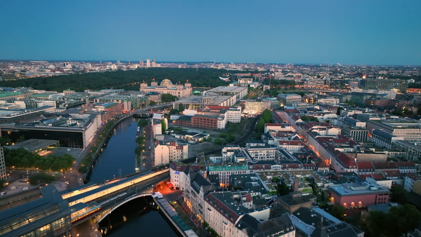 Aerial view of famous places landmarks Reichstag, TV Tower at sunrise. City of Berlin, Germany architectural from above.