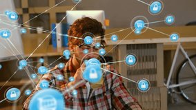 Animation of media icons over caucasian businessman using laptop. Global business and digital interface concept digitally generated video. - Powered by Shutterstock - Get 15% off with code: PIKWIZARD15