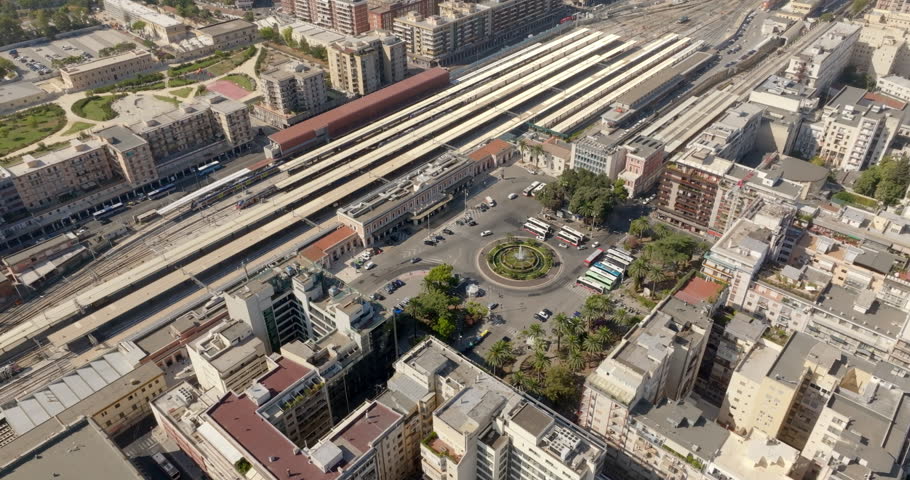 Aerial view of the train station in Bari, Puglia, Italy. There is a large square in front of the main facade.