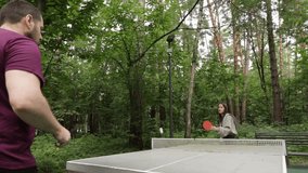 Ping pong players playing table tennis, training for a tournament, teenager and girl on the court. - Powered by Shutterstock - Get 15% off with code: PIKWIZARD15