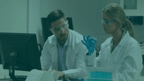 Animation of arrows and data processing over diverse scientists in laboratory. Global science, connections, computing and data processing concept digitally generated video. - Powered by Shutterstock - Get 15% off with code: PIKWIZARD15