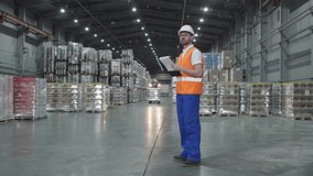 Labourer counting the goods at the storage using a paper inventory checklist. Supervising the inventory of the goods at the storage facility. Inspecting the goods inventory at the factory storage room - Powered by Shutterstock - Get 15% off with code: PIKWIZARD15