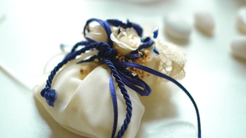 Italian confetti candy (italian sugared almonds) and bomboniere, Concept of a traditional wedding
