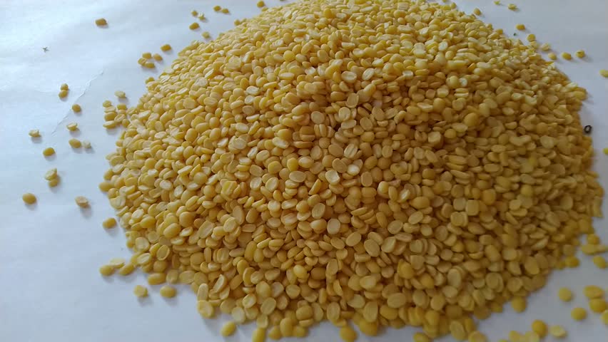 Close up shot of Moong Dal or yellow petite lentils