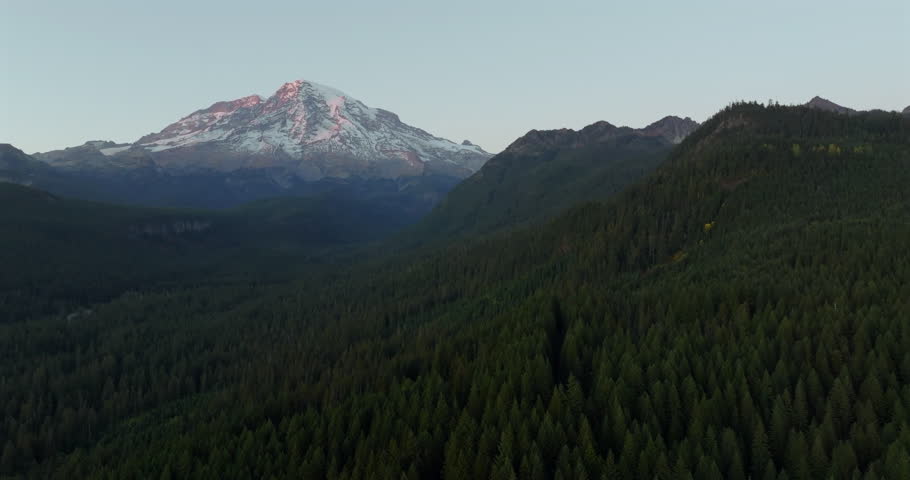 Sunrise Over Mount Rainier with Forest Valley in the Early Morning