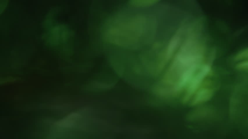 Light Leaks footage. Lens glow flare green bokeh overlays, burn flame background. For compositing over footage, stylizing video, transitions. Defocused lamp flash rays effect. Light pulses and glow