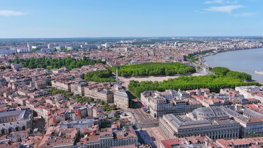 Bordeaux, France: Aerial view of famous French historic city, famous square Place des Quinconces with Monument aux Girondins, summer day with blue sky - landscape panorama of Europe from above