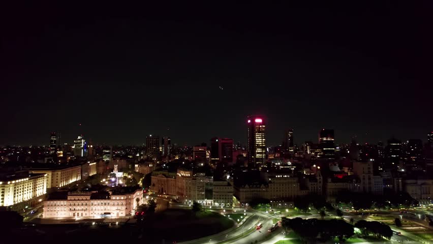 Aerial Dolly Shoot over Buenos Aires City Down Center by Night