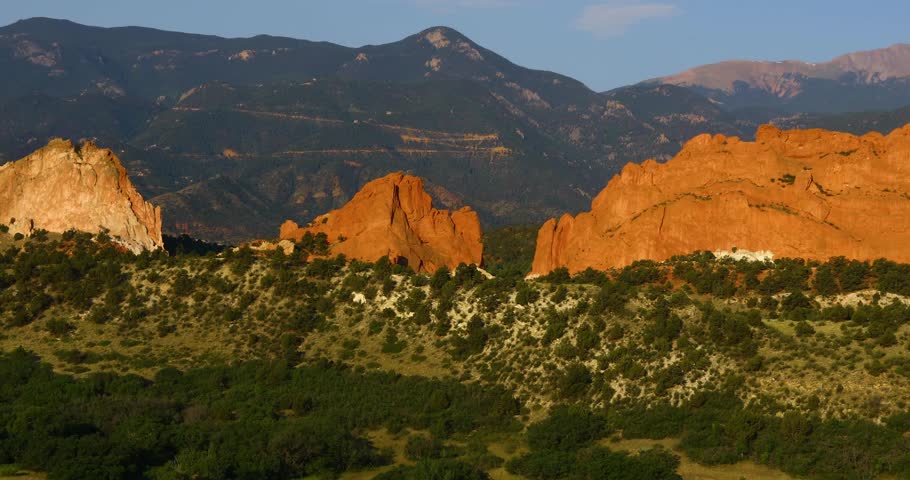 Static video of the Garden of the Gods in Colorado Springs Colorado. Camera zooms out revealing the surrounding mountains.