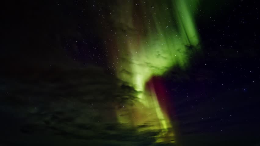 Northern lights in the starry night sky. Time Lapse. Lofoten Islands, Northern Norway.