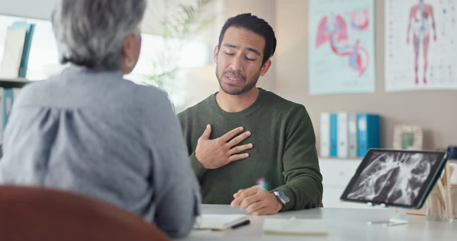 Chest pain, man or doctor in clinic, healthcare or heart attack with cancer crisis. Person, medical or professional with patient, sick or ill with cough, cardiovascular lung fail or tuberculosis risk