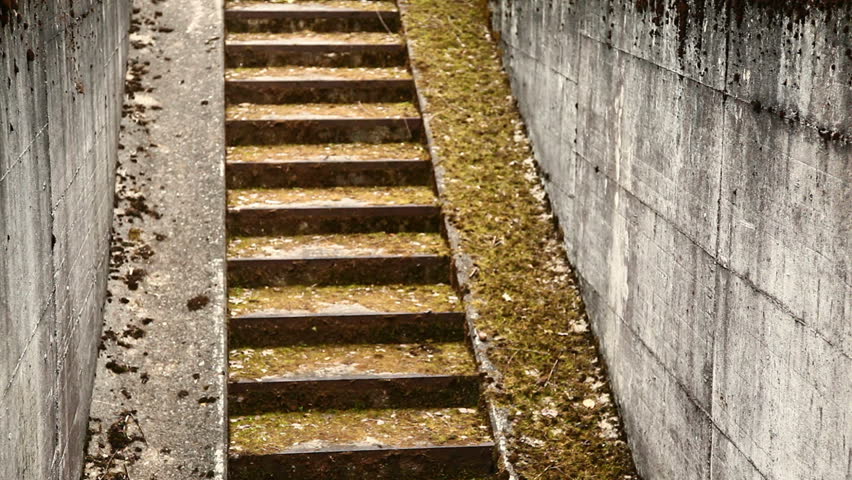 Soldiers running up bunker stairs